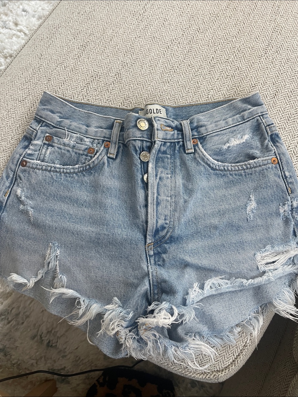 Agolde Light Blue Distressed Denim Cutoff Shorts